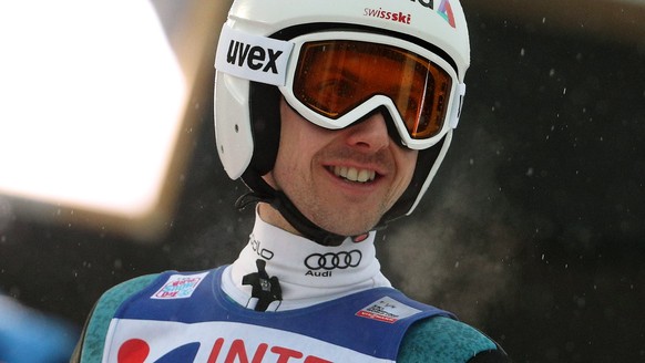 epa06416469 Simon Ammann of Switzerland reacts during the third stage of the 66th Four Hills Tournament in Innsbruck, Austria, 04 January 2018. EPA/LISI NIESNER