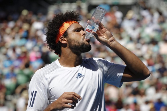 epa05745467 Jo-Wilfried Tsonga of France drinks water during Quarterfinals of the Men&#039;s Singles against Stan Wawrinka of Switzerland at the Australian Open Grand Slam tennis tournament in Melbour ...