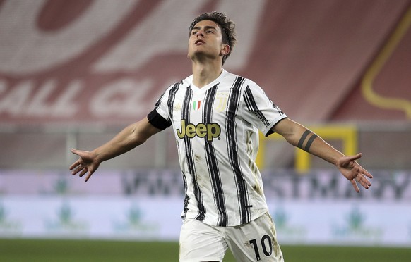 Juventus&#039; Paulo Dybala celebrates scoring during the Italian Serie A soccer match between Genoa and Juventus, at the Luigi Ferraris stadium in Genoa, Italy, Sunday, Dec. 13, 2020. (Tano Pecoraro/ ...