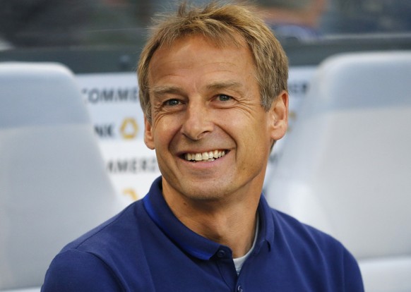 FILE - In this June 10, 20165 file picture United States&#039; head coach Juergen Klinsmann smiles prior to the friendly soccer match between Germany and the United States in Cologne, Germany. Juergen ...