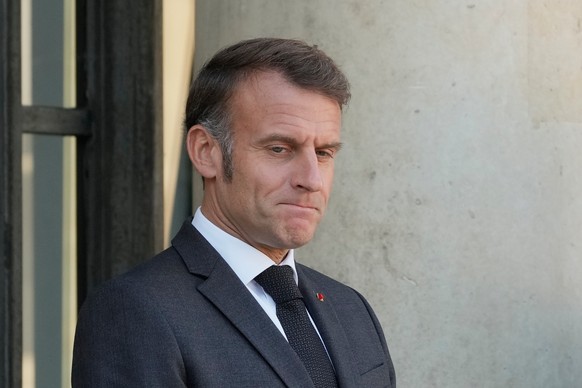 French President Emmanuel Macron waits for European Commission president Ursula von der Leyen, Friday, Oct. 17, 2025 at the Elysee Palace in Paris. (AP Photo/Michel Euler)
France Politics