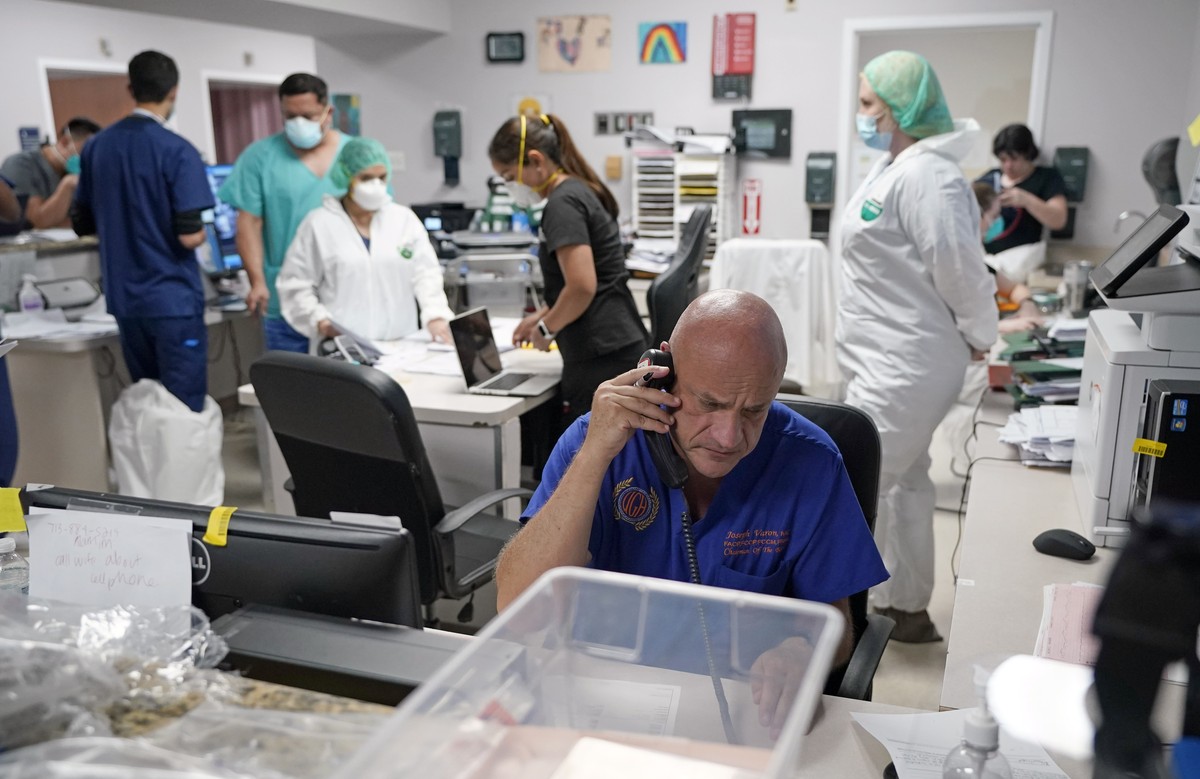Dr. Joseph Varon notifies the family of a patient who died inside the Coronavirus Unit at United Memorial Medical Center, Monday, July 6, 2020, in Houston. Varon called the widow's daughter, expr ...