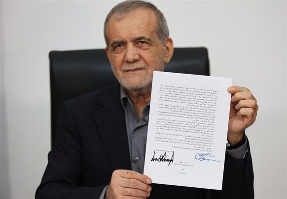 epa13045855 A handout video grab taken from Irans state TV (IRIB) channel shows Iranian President Masoud Pezeshkian (top) shows the Memorandum of Understanding as US president Donald Trump (bottom) s ...