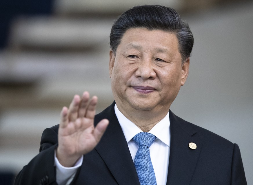FILE - China&#039;s President Xi Jinping greets the media prior to a meeting of leaders of the BRICS emerging economies at the Itamaraty palace in Brasilia, Brazil, on Nov. 14, 2019. Xi has landed Nur ...