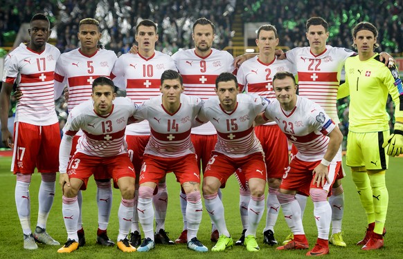 From left to right on the back row, Switzerland&#039;s midfielder Denis Zakaria, Switzerland&#039;s defender Manuel Akanji, Switzerland&#039;s midfielder Granit Xhaka, Switzerland&#039;s forward Haris ...