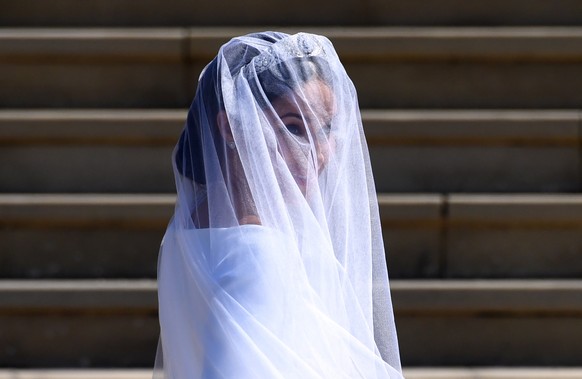 epa06749199 Meghan Markle arrives at St George&#039;s Chapel in Windsor Castle for her royal wedding ceremony to Britain&#039;s Prince Harry, in Windsor, Britain, 19 May 2018, EPA/NEIL HALL / POOL