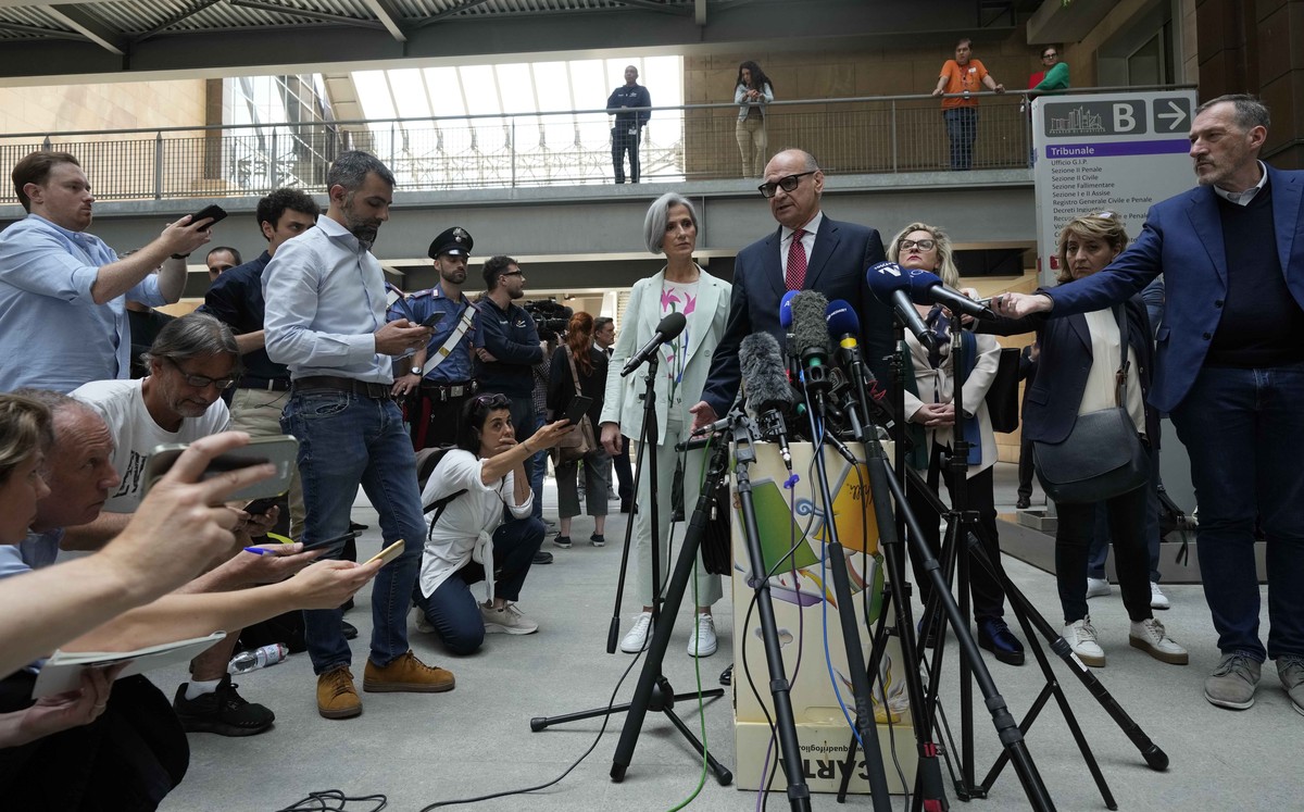 Lumumba's lawyer Carlo Pacelli speaks with reporters after the hearing at the Florence courtroom in Florence, Italy, Wednesday, June 5, 2024. Amanda Knox returns to an Italian courtroom Wednesday ...