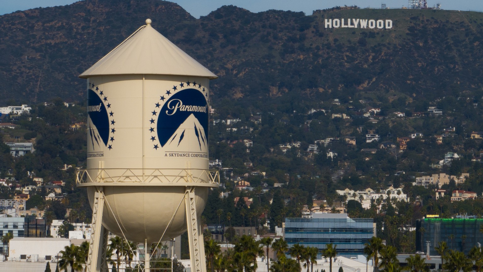 FILE - The Paramount Pictures water tower is seen in Los Angeles, Dec. 18, 2025, with the Hollywood sign in the distance. (AP Photo/Jae C. Hong, File)
Warner Bros