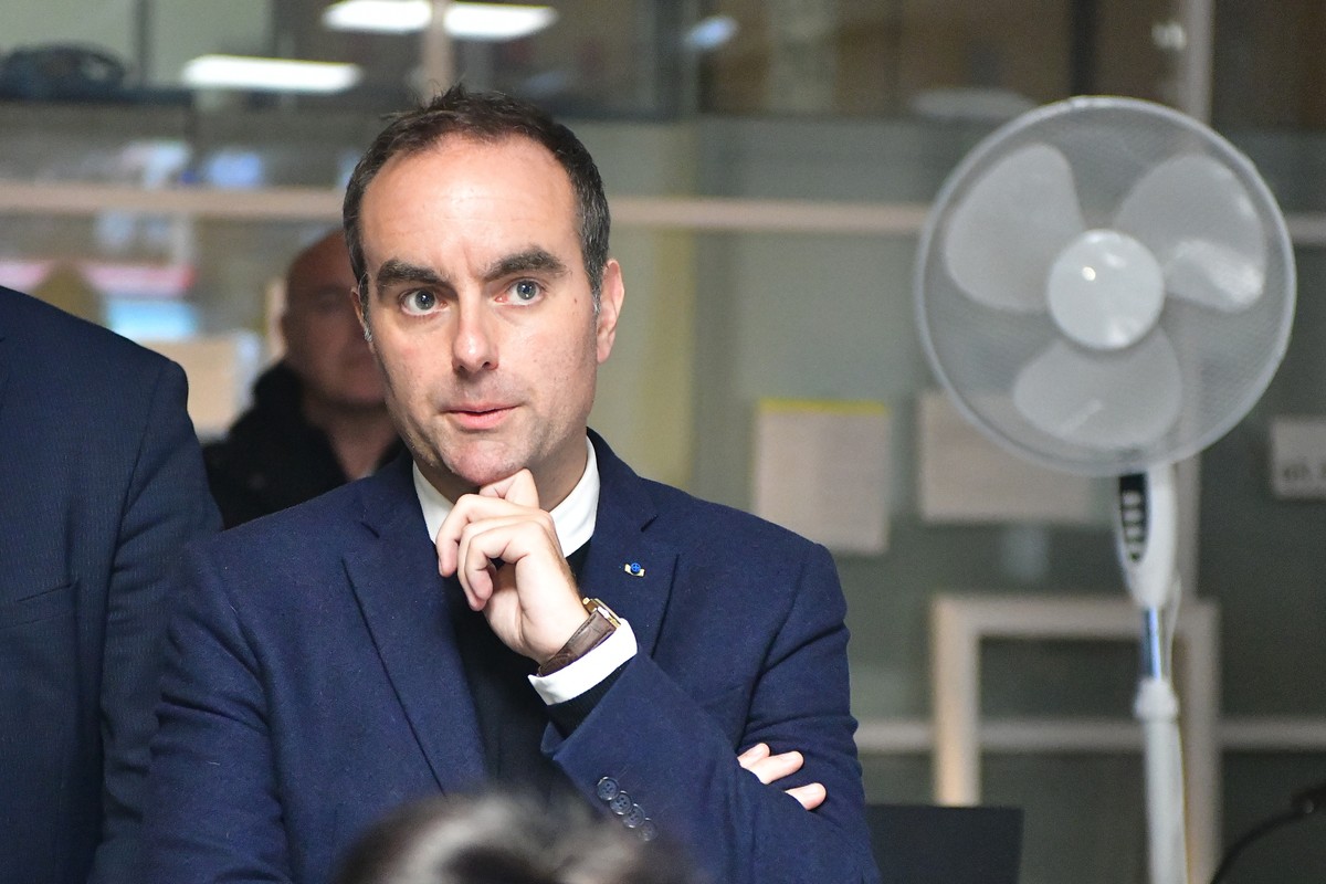 France's Prime Minister Sebastien Lecornu reacts at a police station during a visit to Limoges in the context of security and reconstruction efforts after a group of individuals forced entry into ...