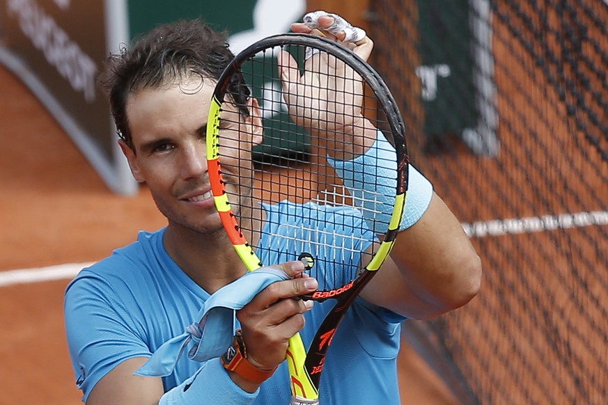 Spain&#039;s Rafael Nadal celebrates after winning his first round match of the French Open tennis tournament against Italy&#039;s Simone Bolelli at the Roland Garros stadium in Paris, France, Tuesday ...