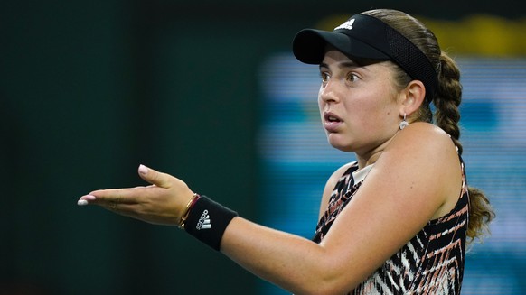 CORRECTS TO JELENA OSTAPENKO, INSTEAD OF ONS JABEUR - Jelena Ostapenko, of Latvia, reacts after losing a point to Victoria Azarenka, of Belarus, at the BNP Paribas Open tennis tournament Friday, Oct.  ...