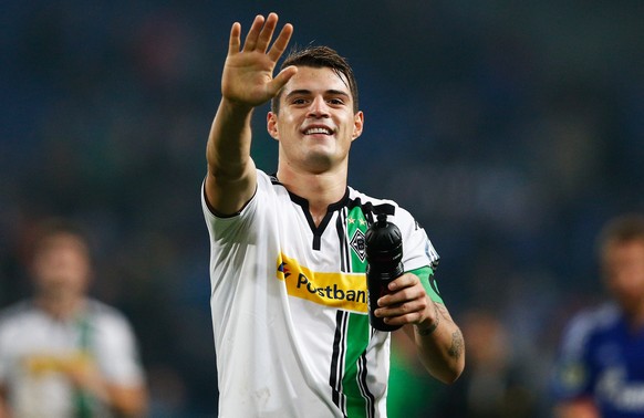 GELSENKIRCHEN, GERMANY - OCTOBER 28: Granit Xhaka of Borussia Monchengladbach celebrates victory after the DFB Cup match between FC Schalke 04 and Borussia Moenchengladbach held at Veltins-Arena on Oc ...