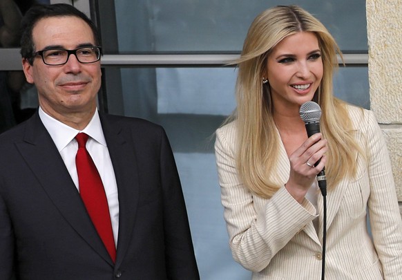 epa06735801 White House senior advisor Ivanka Trump (R) speaks next tio US Treasury Secretary Steven Mnuchin (L) during the opening ceremony at the US consulate that will act as the new US embassy in  ...