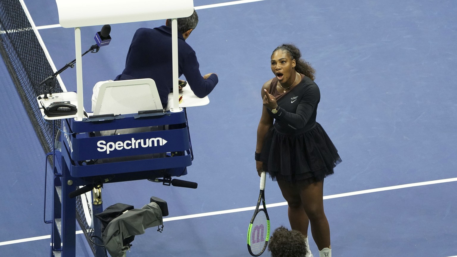 Serena Williams argues with the chair umpire during a match against Naomi Osaka, of Japan, during the women&#039;s finals of the U.S. Open tennis tournament at the USTA Billie Jean King National Tenni ...