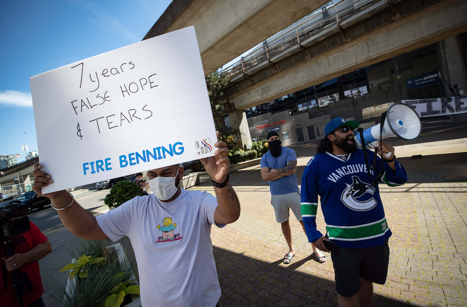 May 22, 2021, Vancouver, BC, Canada: Vancouver Canucks fans protest outside Rogers Arena to call for the firing of the team s general manager, Jim Benning, in Vancouver, on Saturday, May 22, 2021. Can ...
