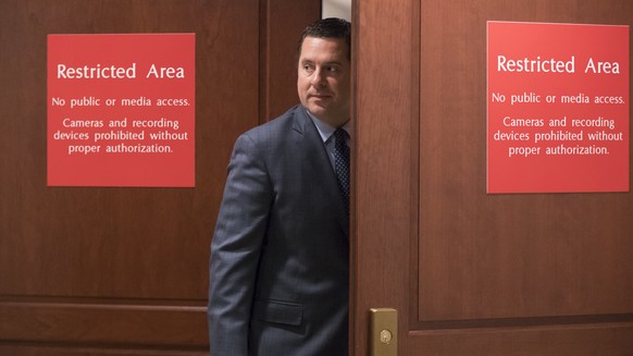 House Intelligence Committee Chairman Devin Nunes, R-Calif., returns to a secure area in the Capitol where his panel is interviewing former White House chief strategist Steve Bannon as part of its ong ...