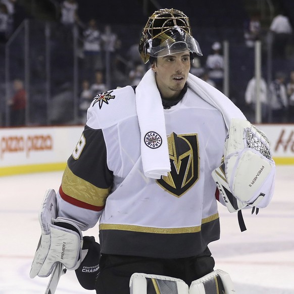 Vegas Golden Knights goaltender Marc-Andre Fleury (29) skates off the ice after defeating the Winnipeg Jets during NHL Western Conference Finals, game 5, in Winnipeg, Sunday, May 20, 2018. (Trevor Hag ...