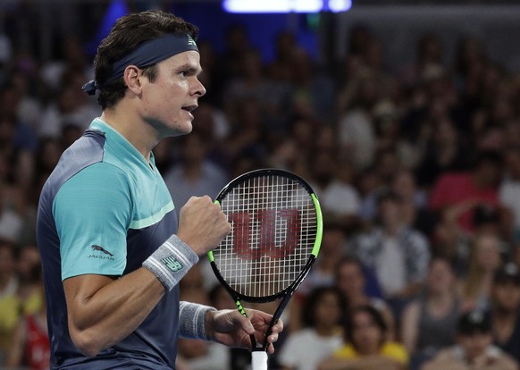 Canada&#039;s Milos Raonic reacts after winning a point against Australia&#039;s Nick Kyrgios during their first round match at the Australian Open tennis championships in Melbourne, Australia, Tuesda ...