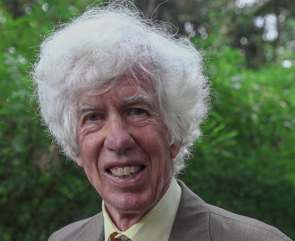 FILE - In this Monday, Feb. 8, 2016 file photo, Esmond Martin, an expert on the illegal ivory trade, attends a news conference at his home in Nairobi, Kenya. Kenya police and officials say Esmond Mart ...