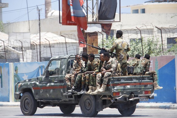 Somalia security officers patrol near the SYL hotel building which was attacked on Thursday by al-Shabab Islamic extremist rebels in Mogadishu, Somalia, Friday March 15, 2024. The Somali extremist gro ...