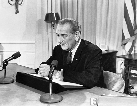 FILE - President Lyndon Johnson tells a nationwide audience that he would not seek nor accept &quot;the nomination of my party for another term as your president,&quot; March 31, 1968, from his White  ...