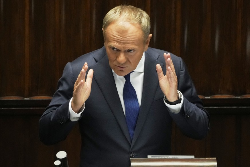 Poland&#039;s Prime Minister Donald Tusk addresses the Polish parliament on Wednesday, June 11, 2025, in Warsaw, Poland. (AP Photo/Czarek Sokolowski)
Poland Politics