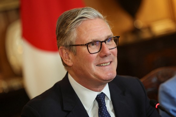Britain's Prime Minister Keir Starmer and Japan's Prime Minister Sanae Takaichi, not pictured, attend a business roundtable meeting in Downing Street in London, Sunday, June 14, 2026. (Toby  ...