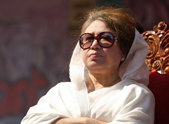 epa12617600 (FILE) Khaleda Zia, the country's former prime minister and leader of the main opposition Bangladesh Nationalist Party (BNP), attends a BNP rally at Paltan in Dhaka, Bangladesh, 12 Ma ...
