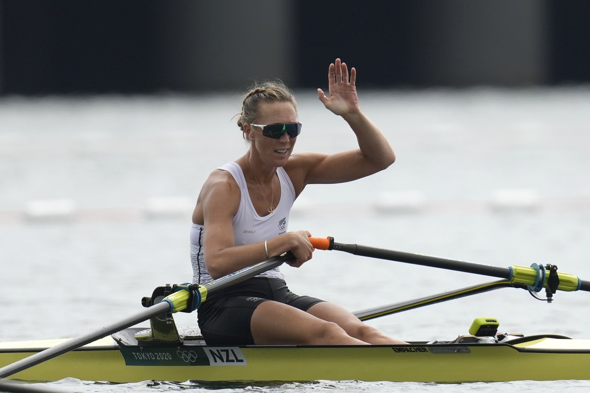 Emma Twigg, of New Zealand reacts after winning the gold medal in the women's rowing single sculls final at the 2020 Summer Olympics, Friday, July 30, 2021, in Tokyo, Japan. (AP Photo/Lee Jin-man ...