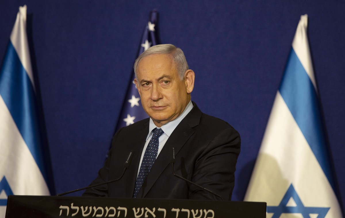 Israeli Prime Minister Benjamin Netanyahu listens during a news conference in Jerusalem, Thursday, Nov. 19, 2020. Israel