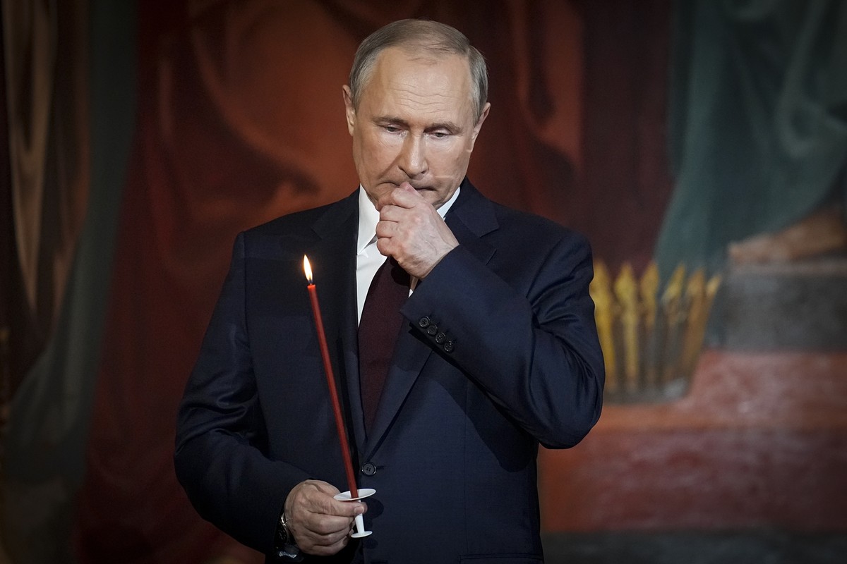 Russian President Vladimir Putin attends an Orthodox Easter service in the Christ the Savior Cathedral in Moscow, Russia, on Sunday, April 24, 2022. Putin sent forces into Ukraine on Feb. 24, 2022, ap ...