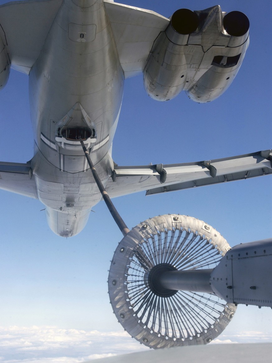 A Hercules C130K and VC10 from 1312 Flight, Mount Pleasant Airfield. Practice Air to Air refuelling in the skies above the Falkland Islands.
Title: Basket Case, Category D: RAF Equipment. This image ...