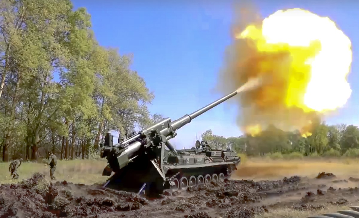 In this handout photo released by Russian Defense Ministry Press Service released on Sunday, June 5, 2022. A Pion artillery system of the Russian military fires at a target in an undisclosed location  ...