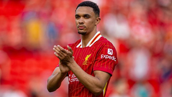 250512 -- LIVERPOOL, May 12, 2025 -- Liverpool s Trent Alexander-Arnold applauds the supporters after the English Premier League match between Liverpool FC and Arsenal FC in Liverpool, Britain, on May ...