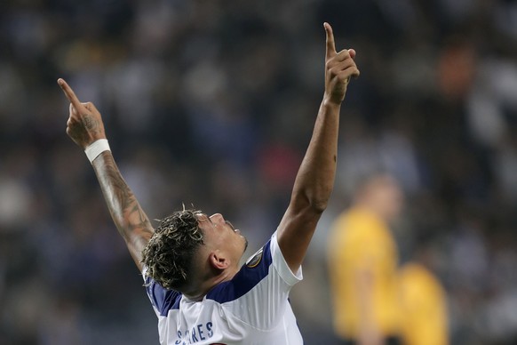 Porto&#039;s Soares celebrates after scoring his side&#039;s second goal during the Europa League group G soccer match between FC Porto and Young Boys at the Dragao stadium in Porto, Portugal, Thursda ...