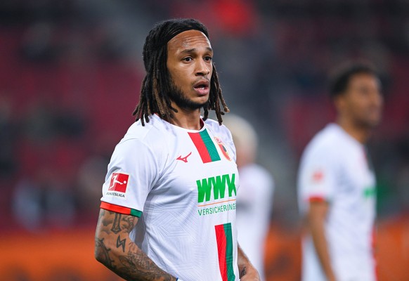 Germany, Augsburg, 25.02.2024, WWK Arena, FC Augsburg vs SC Freiburg - 1. Bundesliga, Kevin Mbabu FC Augsburg looks on Augsburg WWK Arena Bavaria Germany *** Germany, Augsburg, 25 02 2024, WWK Arena,  ...