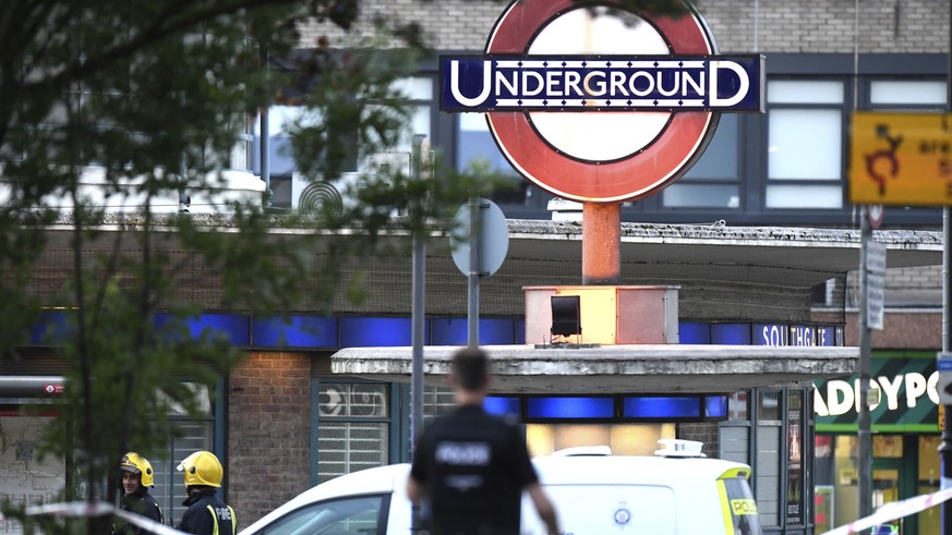 Emergency services attend the scene of a small explosion at Southgate Underground station, in London, Tuesday June 19, 2018. London police are investigating a small explosion at the Southgate Undergro ...