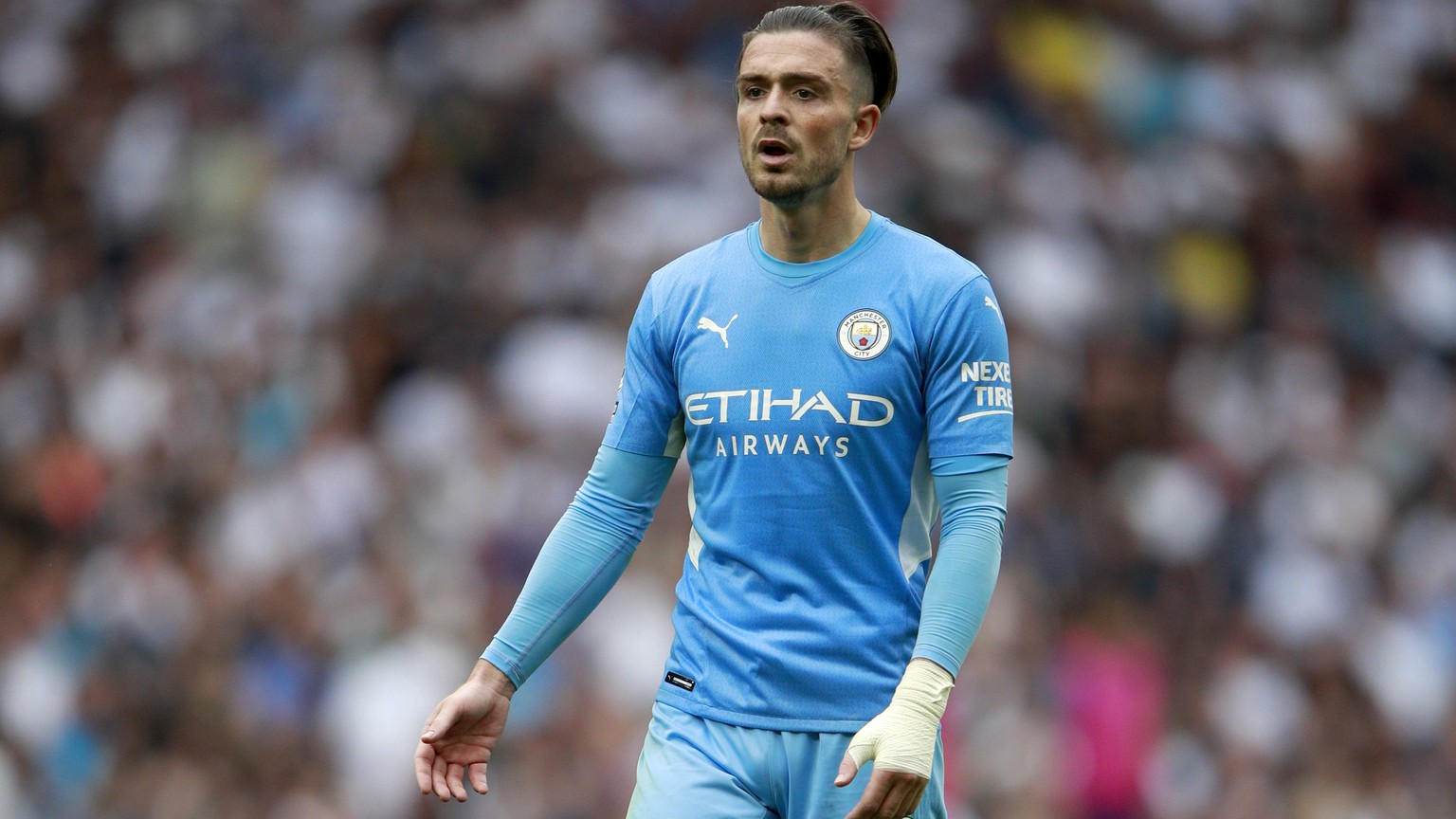 Manchester City&#039;s Jack Grealish reacts during the English Premier League soccer match between Tottenham Hotspur and Manchester City at the Tottenham Hotspur Stadium in London, Sunday, Aug. 15, 20 ...