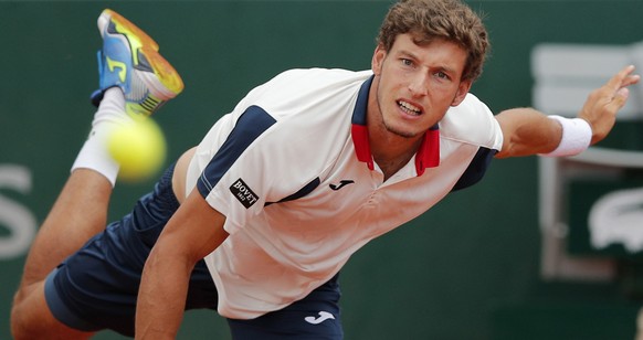 Spain&#039;s Pablo Carreno Busta serves against Canada&#039;s Milos Raonic during their fourth round match of the French Open tennis tournament at the Roland Garros stadium, in Paris, France. Sunday,  ...