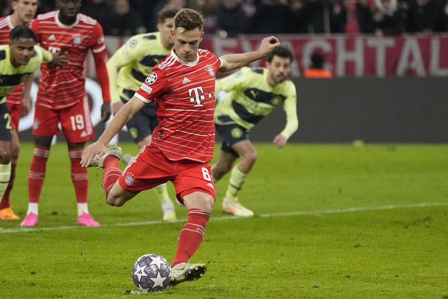 Bayern&#039;s Joshua Kimmich scores his side&#039;s opening goal from a penalty kick during the Champions League quarter final second leg soccer match between Bayern Munich and Manchester City, at the ...