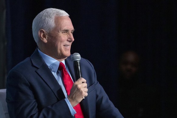 FILE - Former Vice President Mike Pence speaks at the National Review Ideas Summit, Friday, March 31, 2023, in Washington.  Ten Republican White House candidates will speak on Saturday, April 22 at…