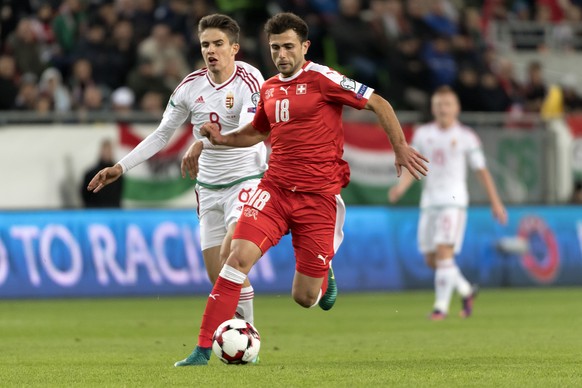 Hungary&#039;s Adam Nagy, left, fights for the ball against Switzerland&#039;s Admir Mehmedi, right, during the 2018 Fifa World Cup Russia group B qualification soccer match between Hungary and Switze ...