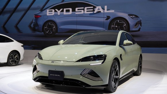 epa10937481 The BYD Seal electric model is displayed at the Japan Mobility Show 2023 in Tokyo, Japan, 25 October 2023. The BYD Seal is scheduled to go on sale in Japan from Spring 2024. The Japan Mobi ...