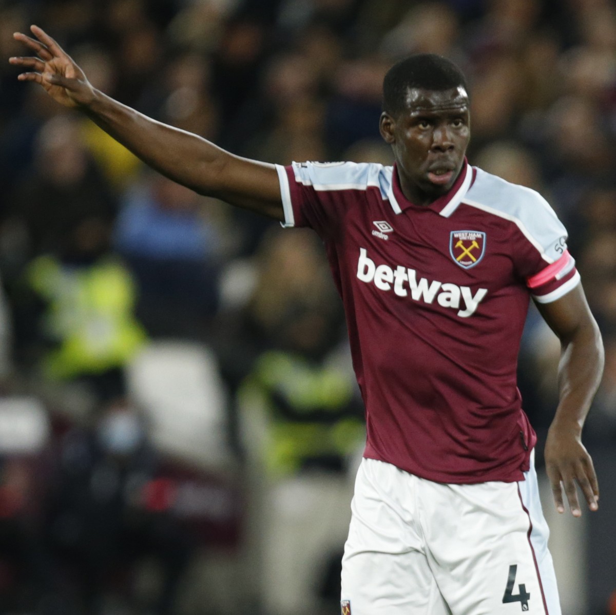 West Ham's Kurt Zouma signals during an English Premier League soccer match between West Ham United and Watford at the London stadium in London, Tuesday, Feb. 8, 2022. (AP Photo/David Cliff)