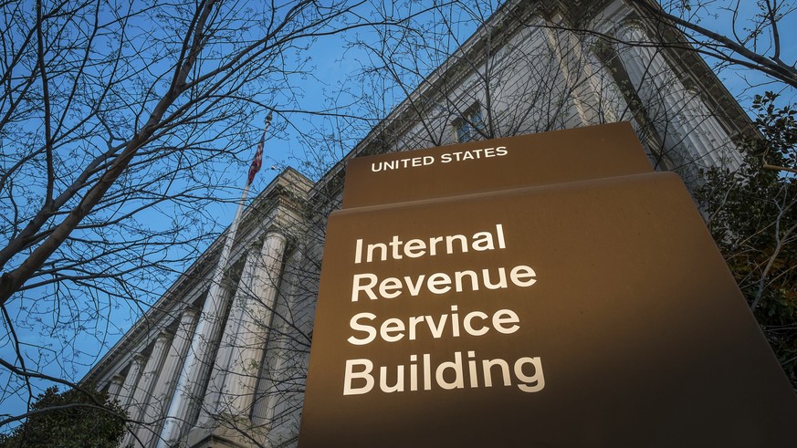 FILE -This April 13, 2014 file photo shows the headquarters of the Internal Revenue Service (IRS) in Washington. The Trump administration has settled lawsuits with dozens of tea party groups who said  ...