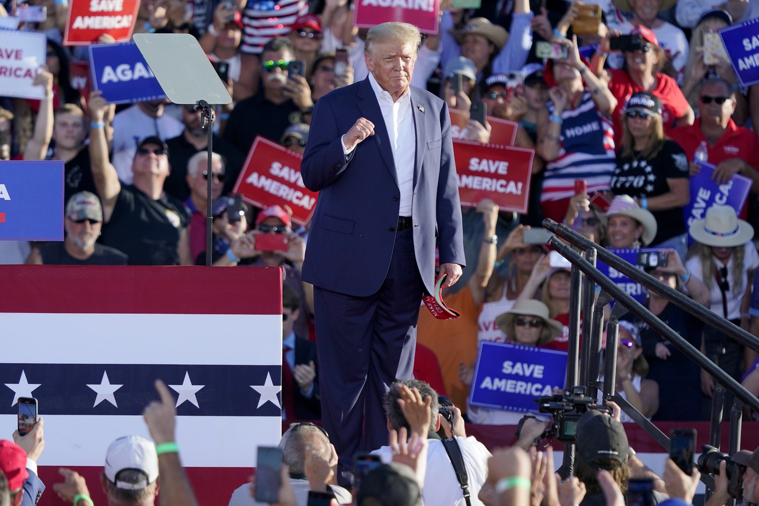 Former President Donald Trump acknowledges supporters at a rally, Sunday, Oct. 9, 2022, in Mesa, Ariz. (AP Photo/Matt York)