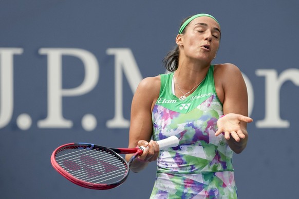 Caroline Garcia, of France, reacts during a match against Wang Yafan, of China, during the first round of the U.S. Open tennis championships, Tuesday, Aug. 29, 2023, in New York. (AP Photo/Mary Altaff ...