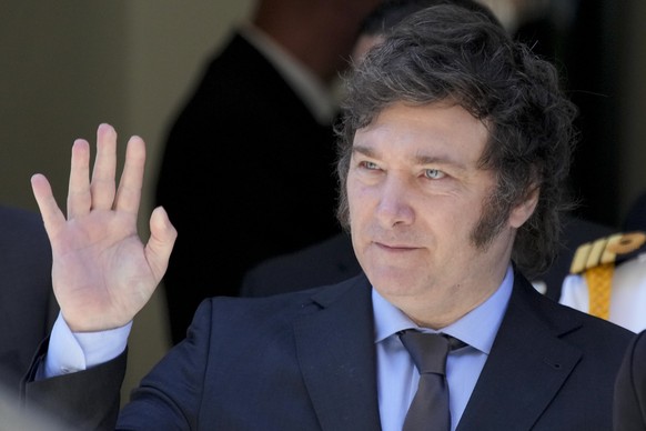 Argentine President Javier Milei leaves the Holocaust Museum after attending an event commemorating the International Day in Memory of the Victims of the Holocaust in Buenos Aires, Argentina, Friday, January 1...