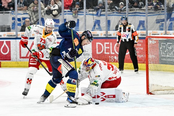 Manix Landry (HCAP) scores a goal against Goalie Harri Saeteri (EHCB), during the regular season National League game between HC Ambri Piotta and EHC Biel at the ice stadium Gottardo Arena, Switzerlan ...