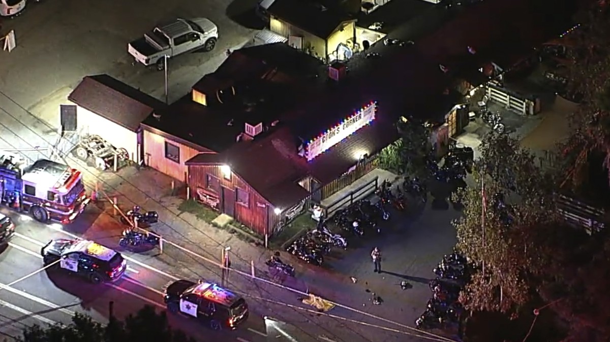 In an image from video, authorities work at the scene of a fatal shooting Wednesday, Aug. 23, 2023, at Cook's Corner, a biker bar in rural Trabuco Canyon, Calif., in Orange County. (ABC7 Los Ange ...